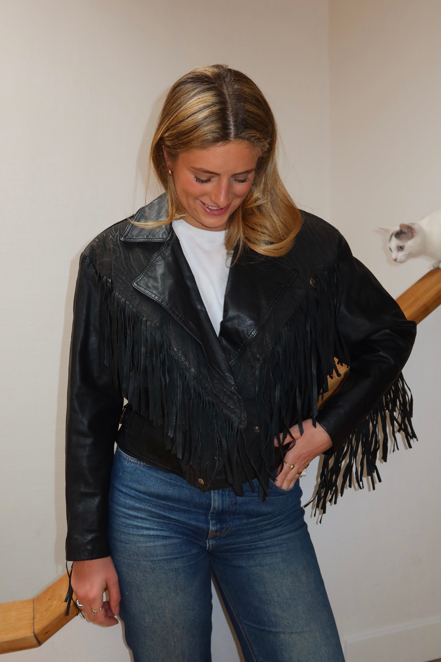 Veste en cuir noire à franges
