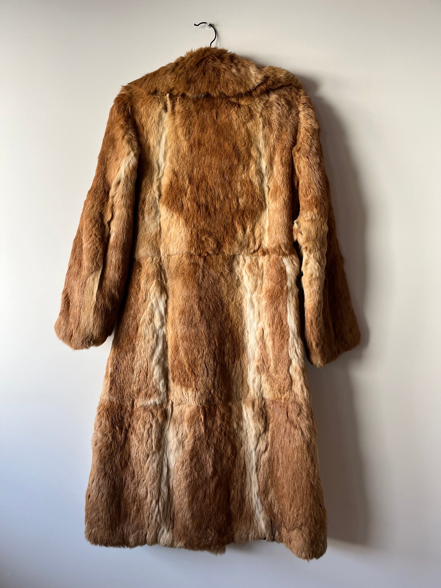 Manteau long en fourrure beige