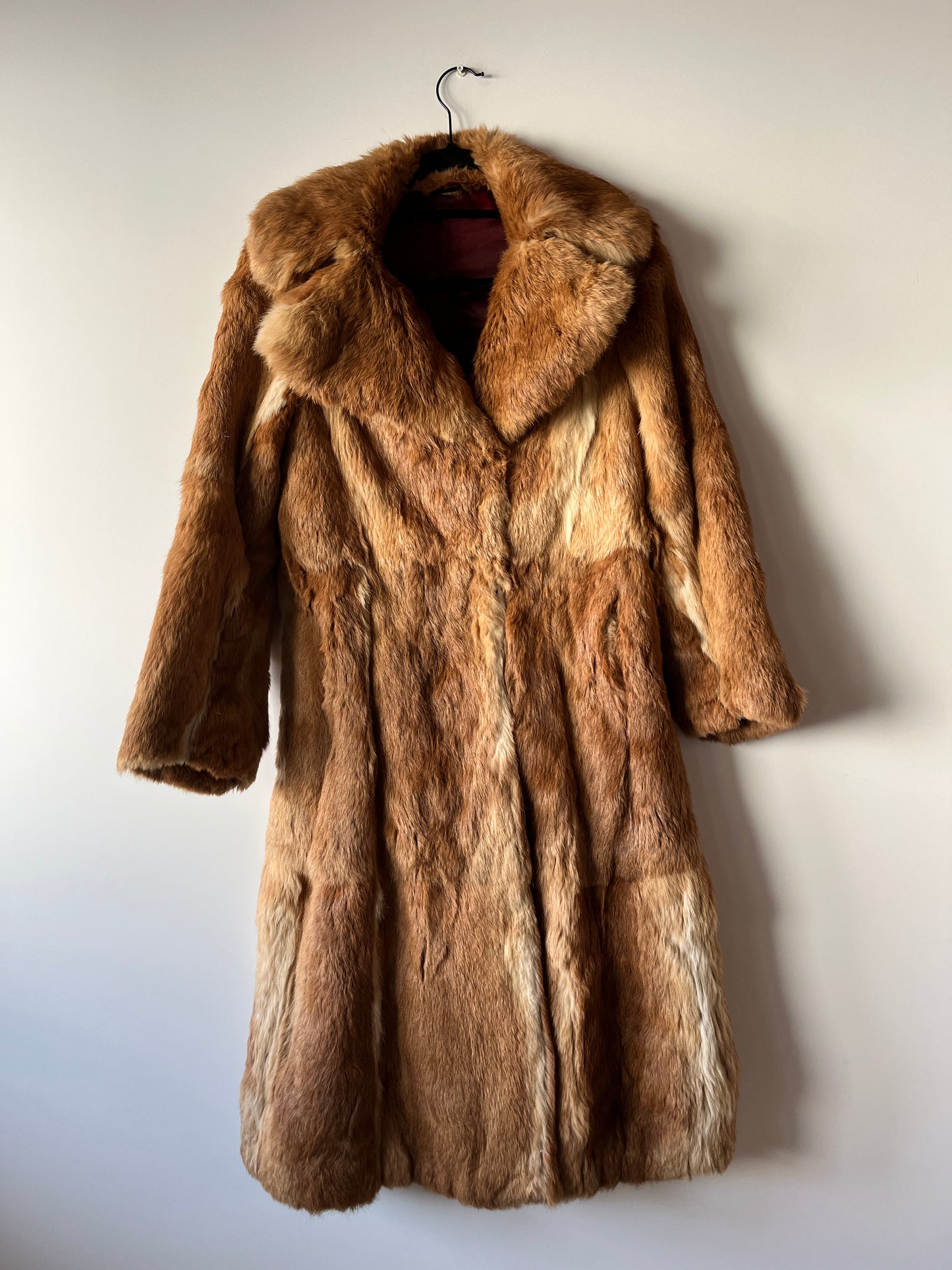 Manteau long en fourrure beige