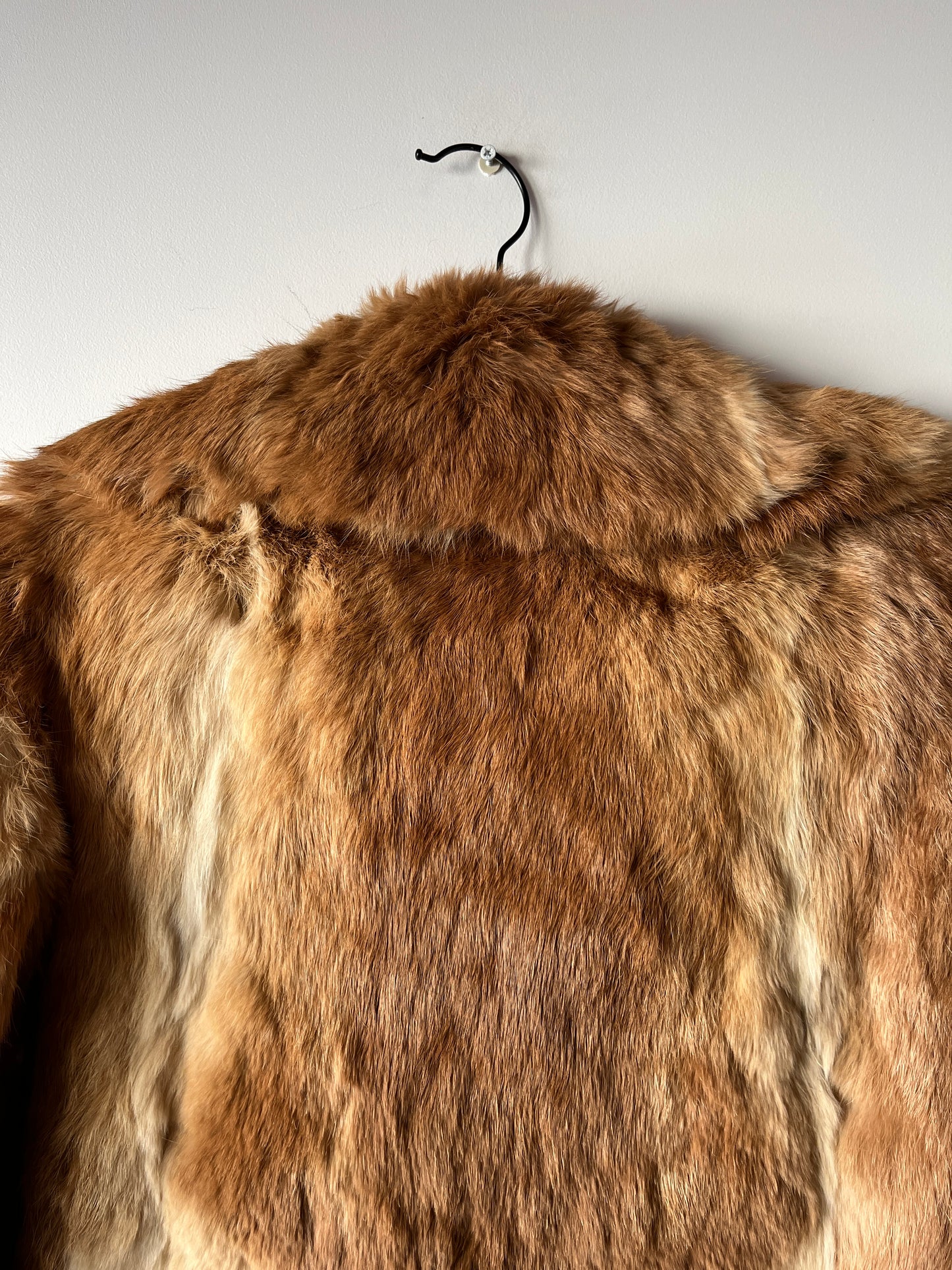 Manteau long en fourrure beige
