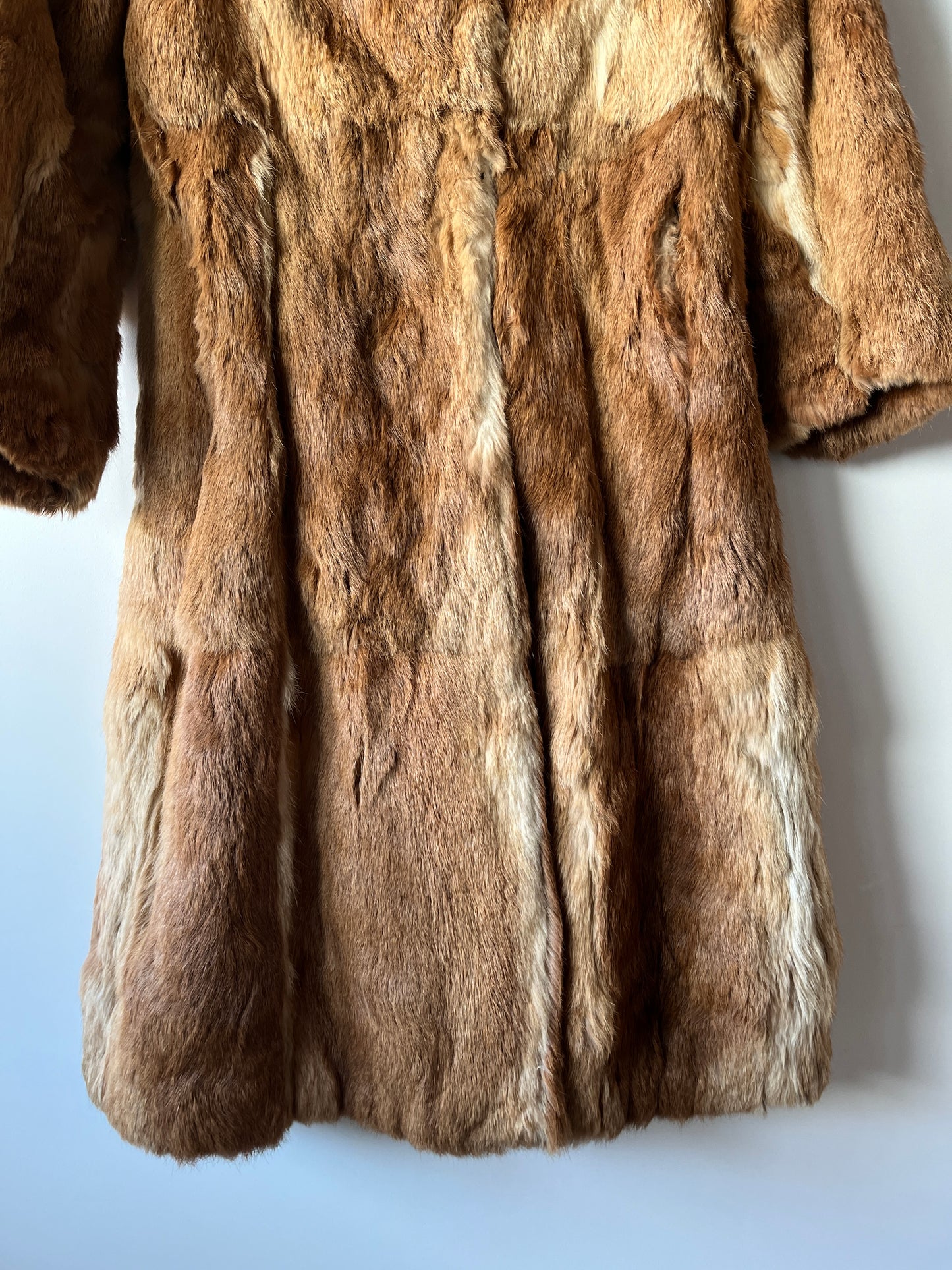 Manteau long en fourrure beige