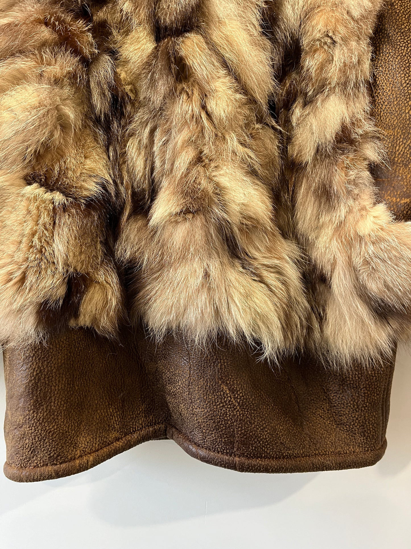 Veste en fourrure et cuir marron
