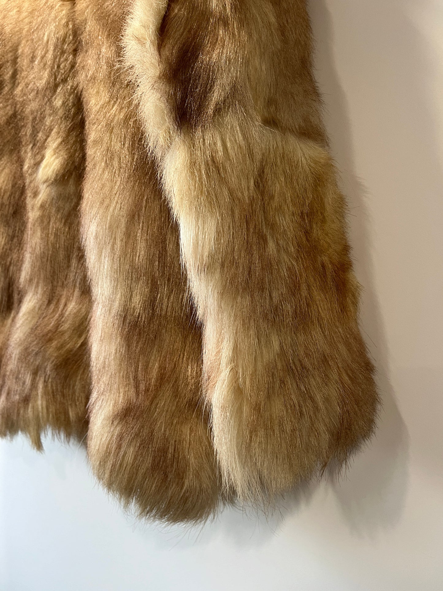 Manteau en fourrure beige