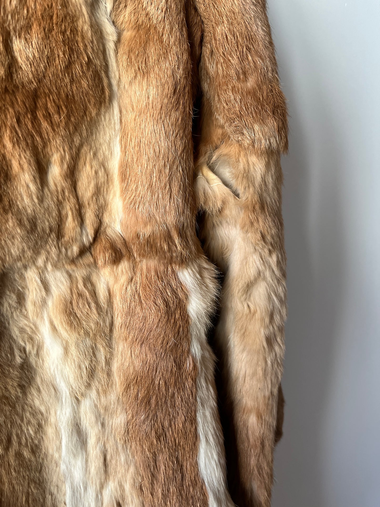 Manteau long en fourrure beige