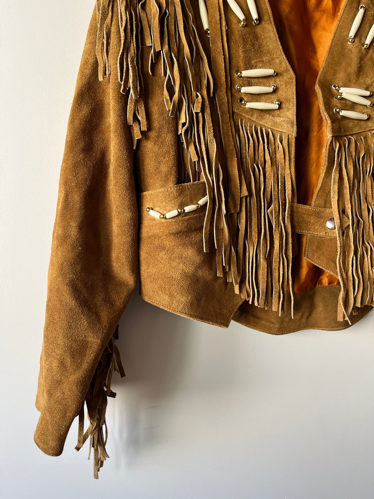 Veste en cuir camel à franges
