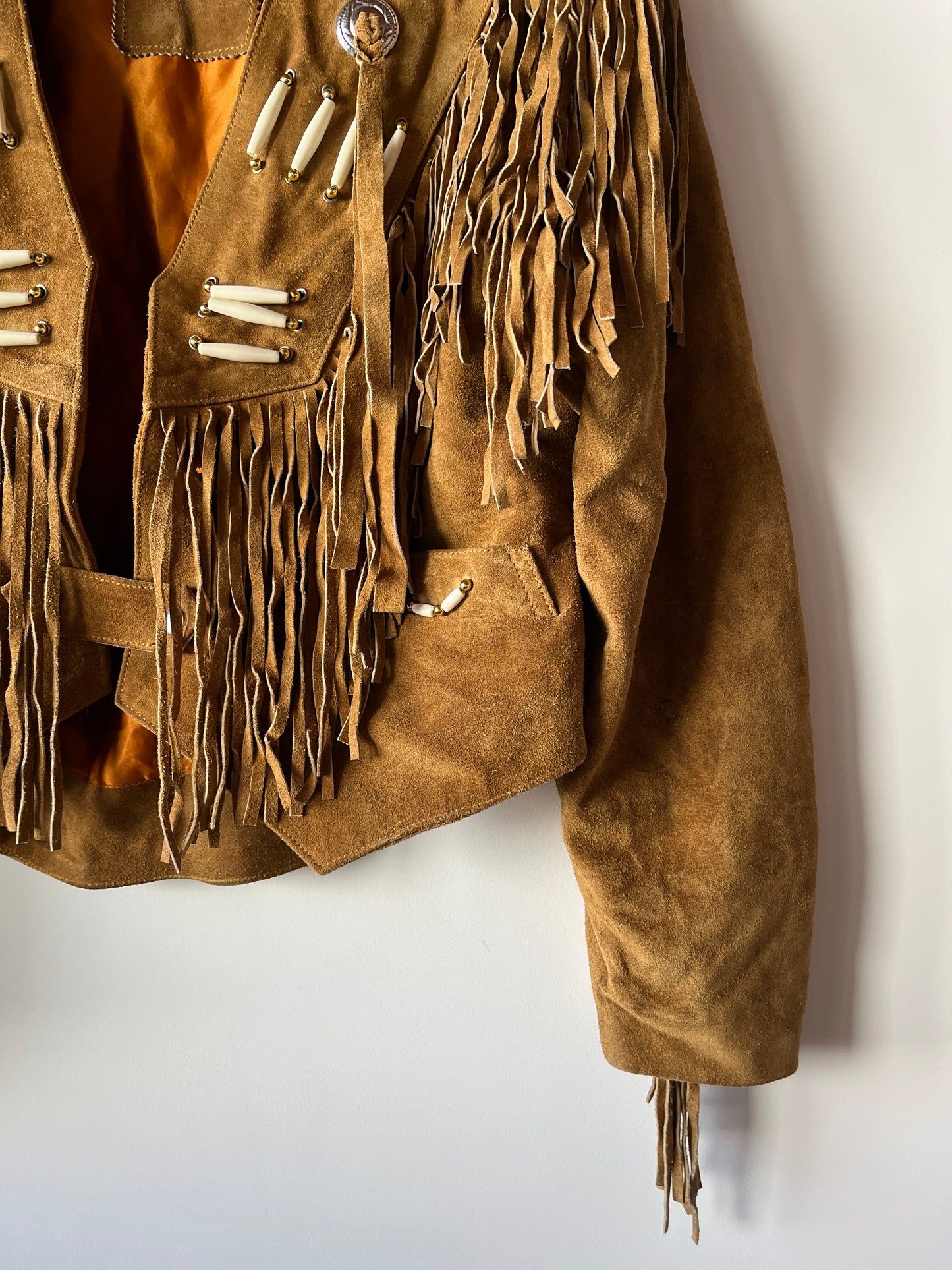 Veste en cuir camel à franges