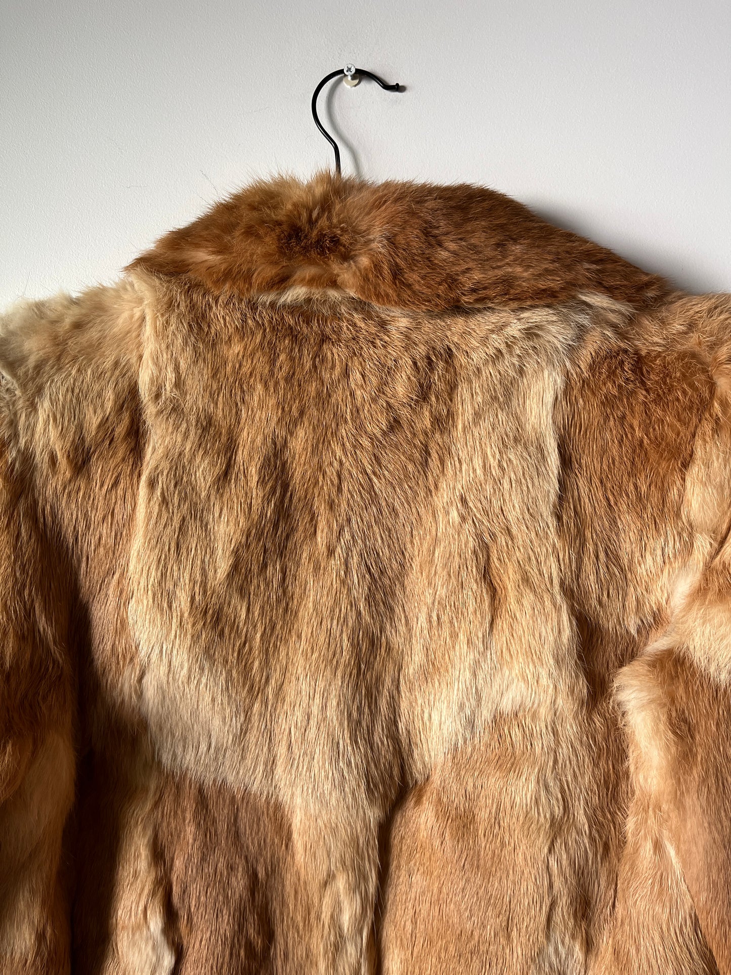 Manteau en fourrure beige