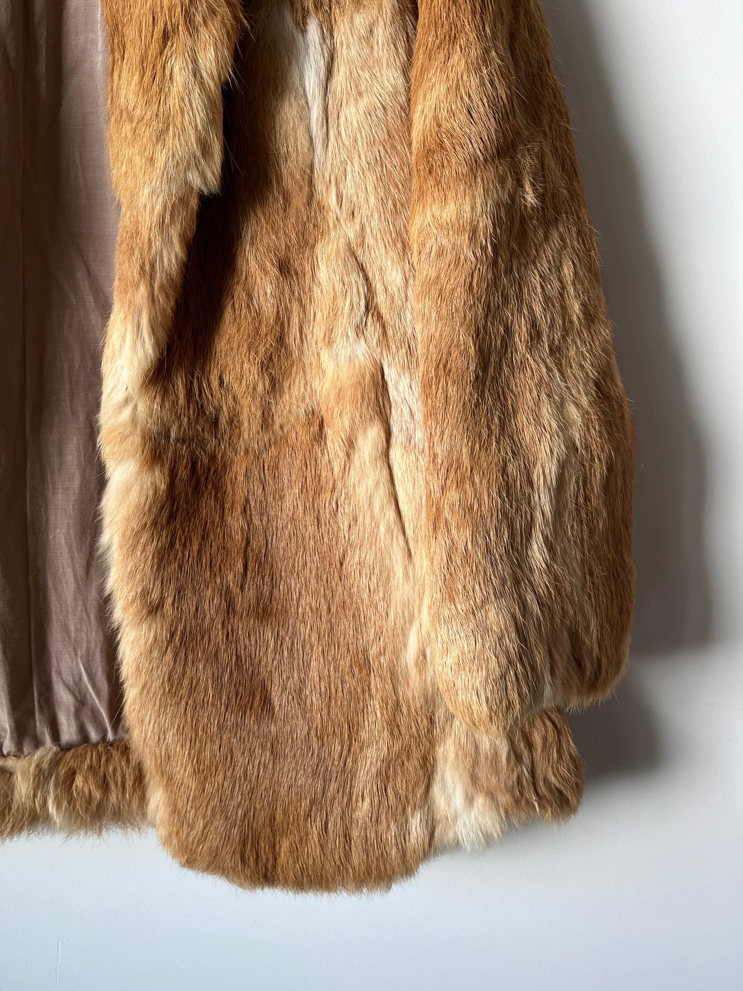 Manteau en fourrure beige