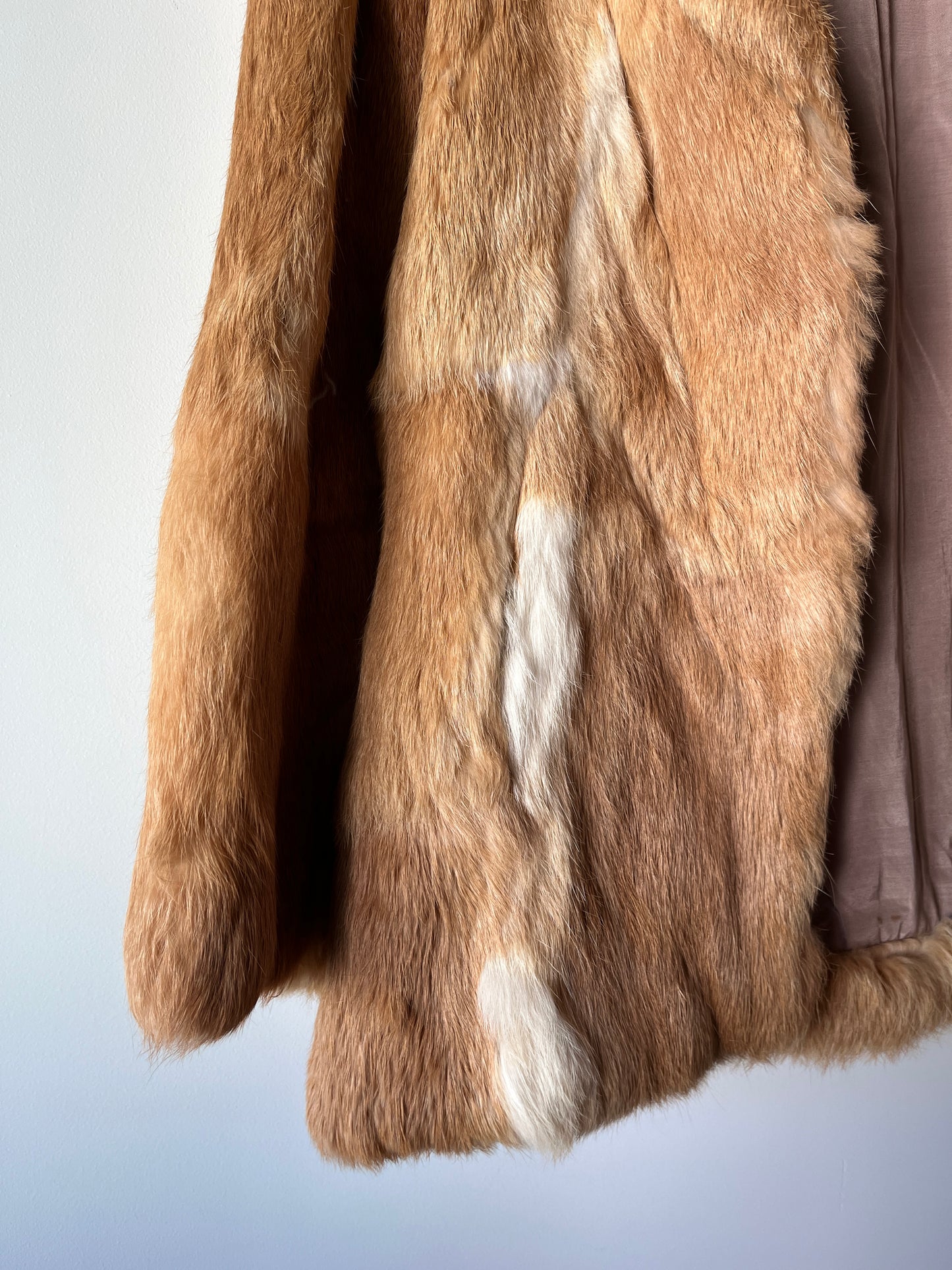 Manteau en fourrure beige