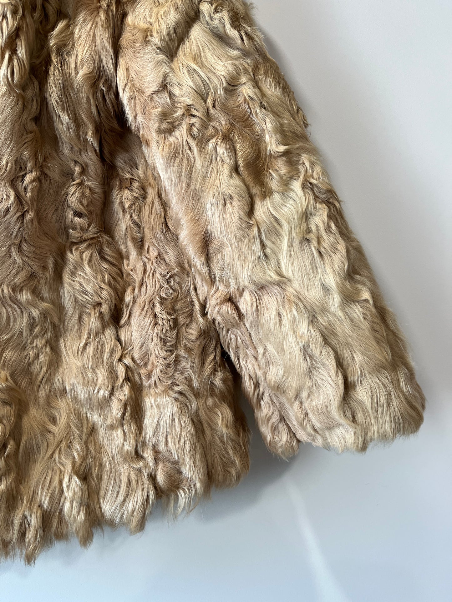 Manteau en fourrure beige