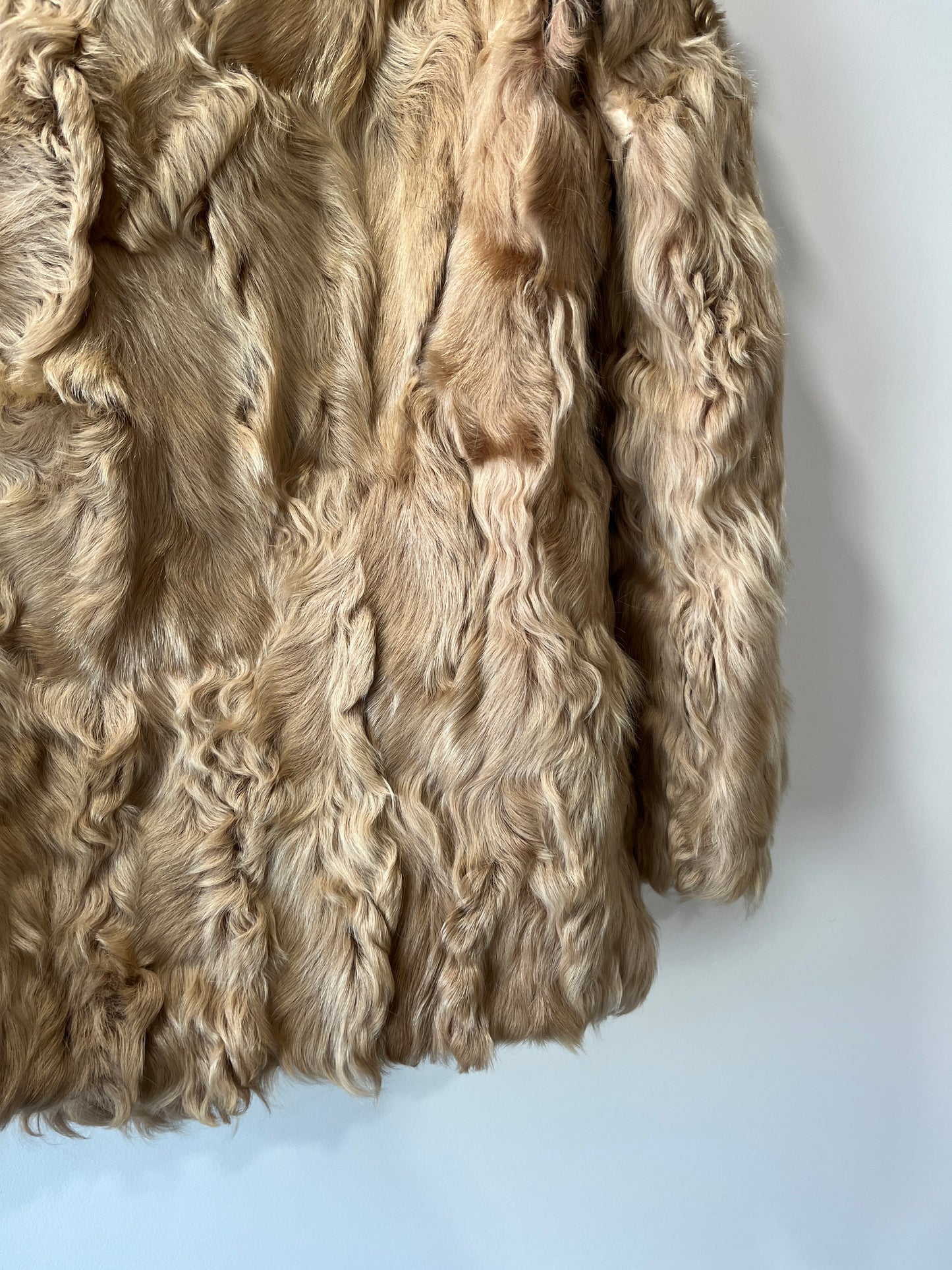 Manteau en fourrure beige
