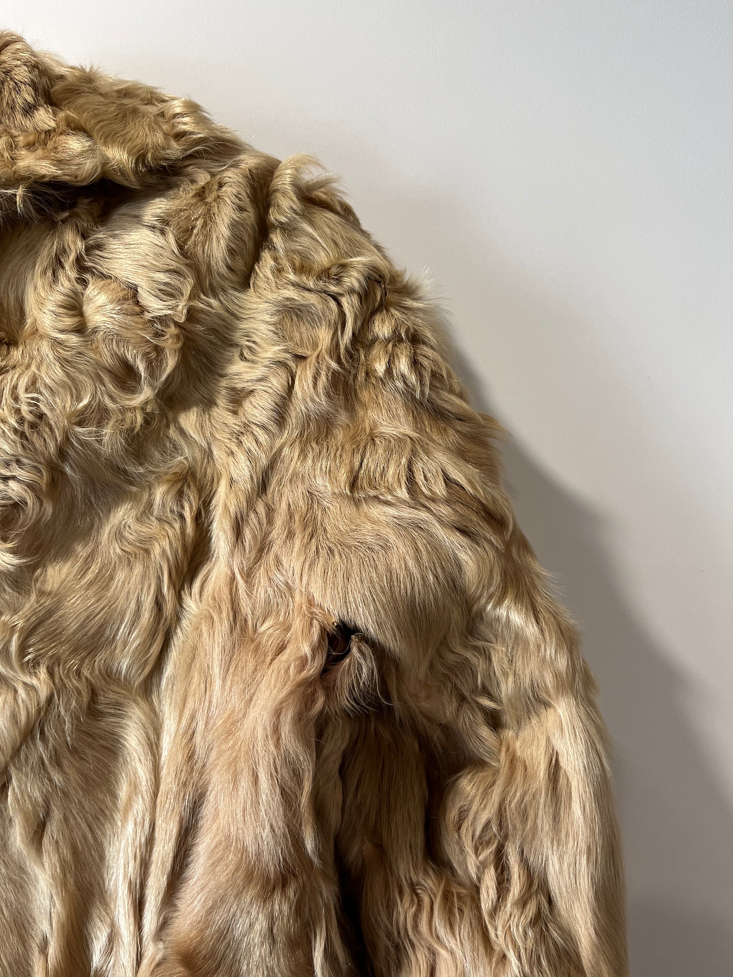 Manteau en fourrure beige