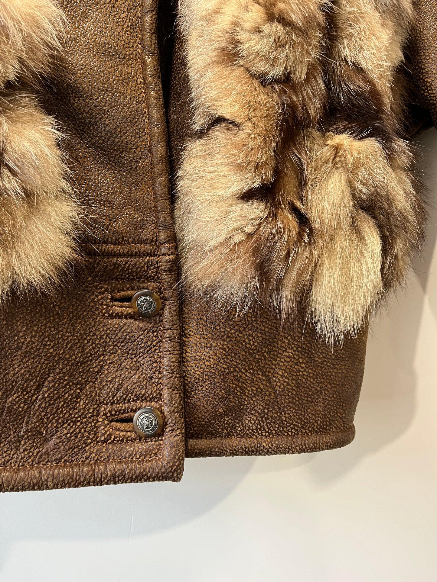 Veste en fourrure et cuir marron