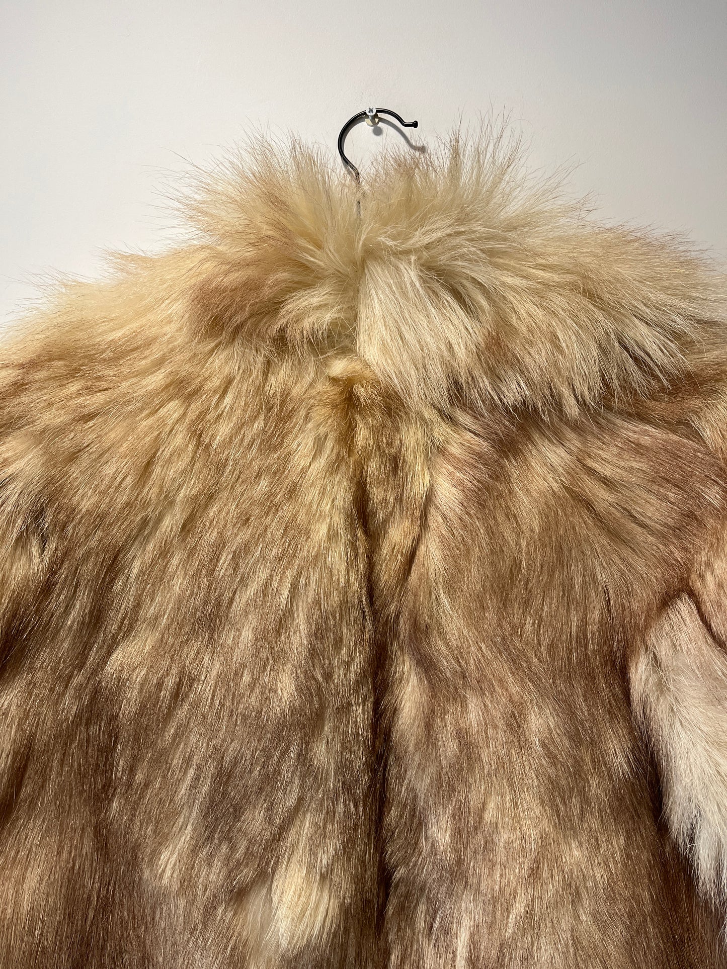 Manteau en fourrure beige