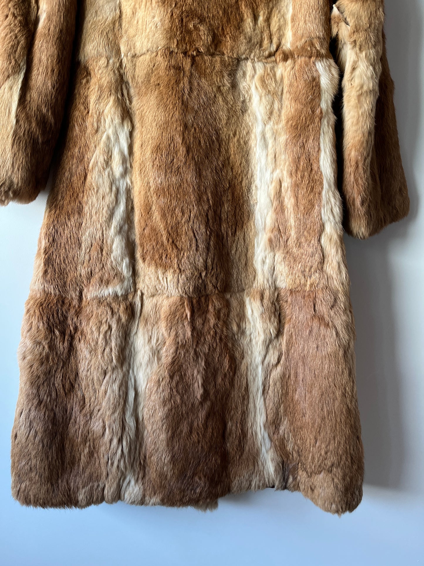 Manteau long en fourrure beige