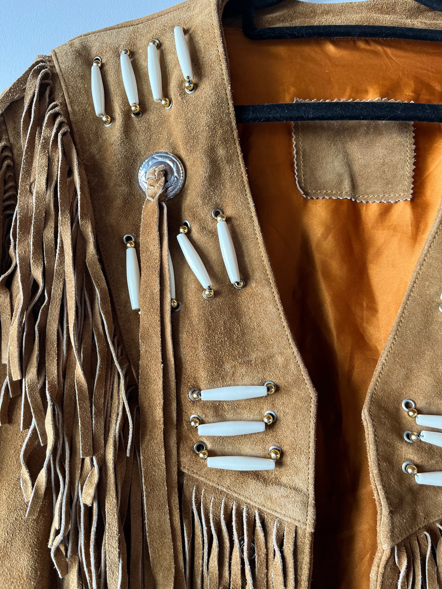 Veste en cuir camel à franges