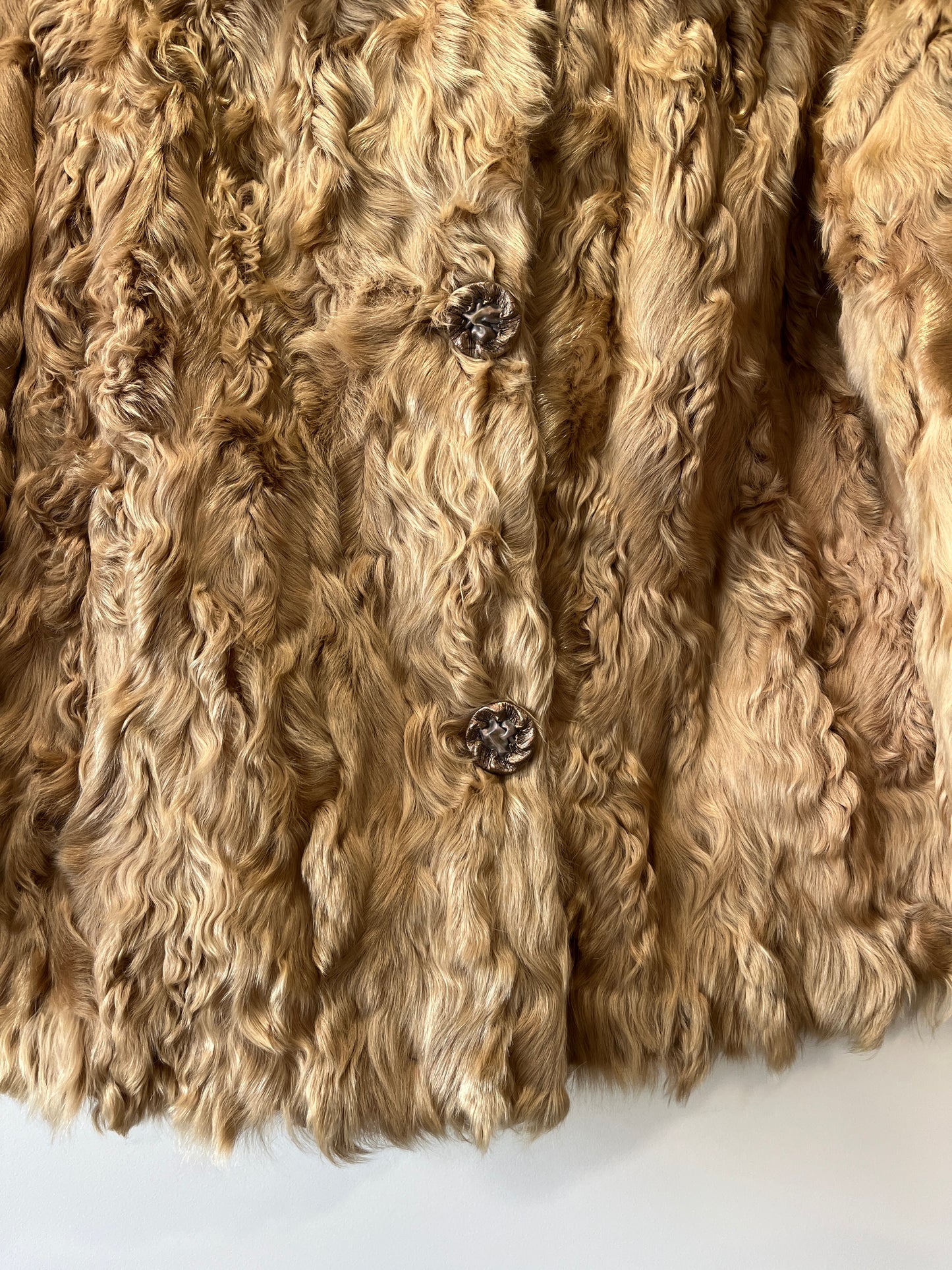 Manteau en fourrure beige