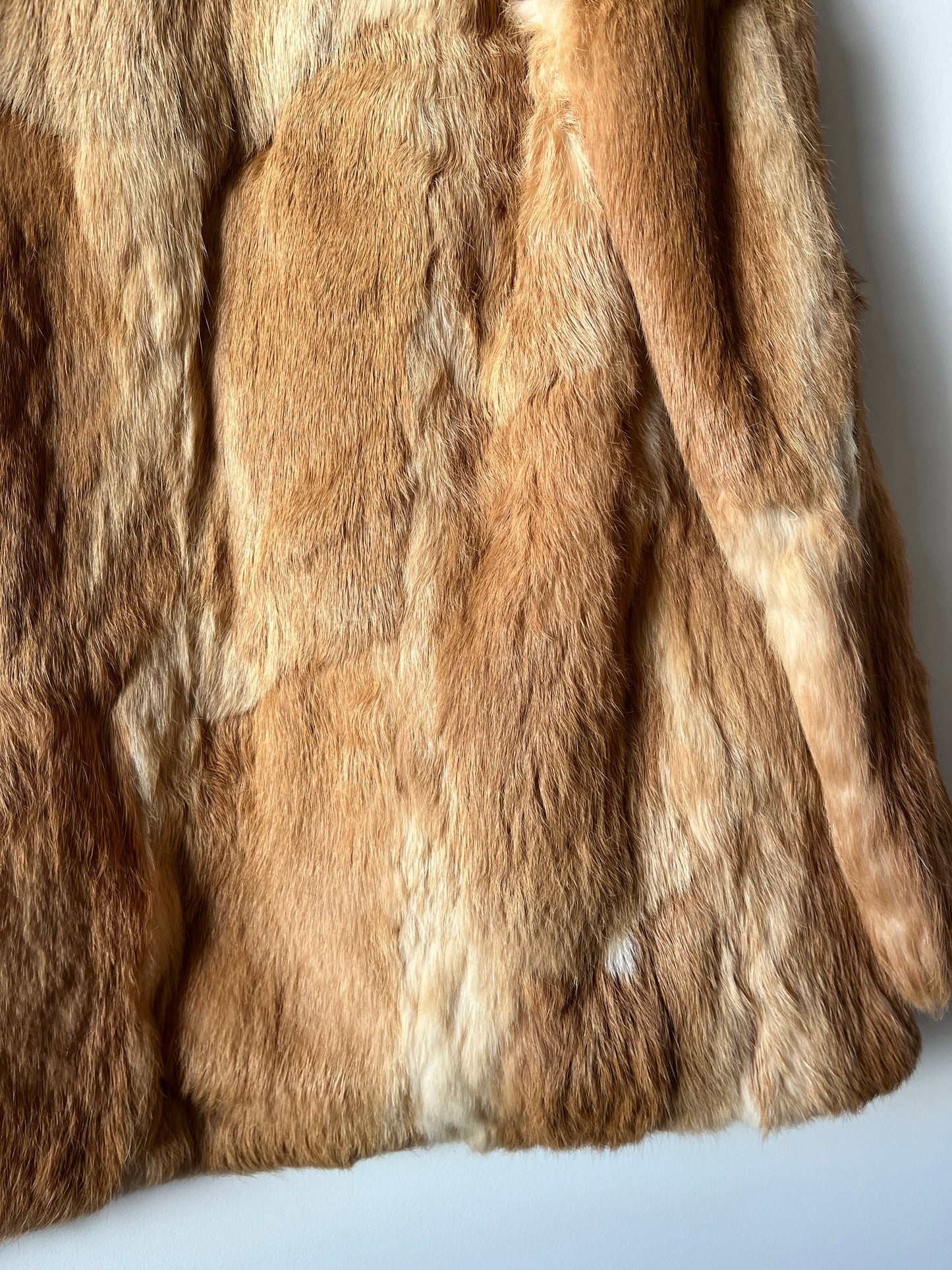 Manteau en fourrure beige