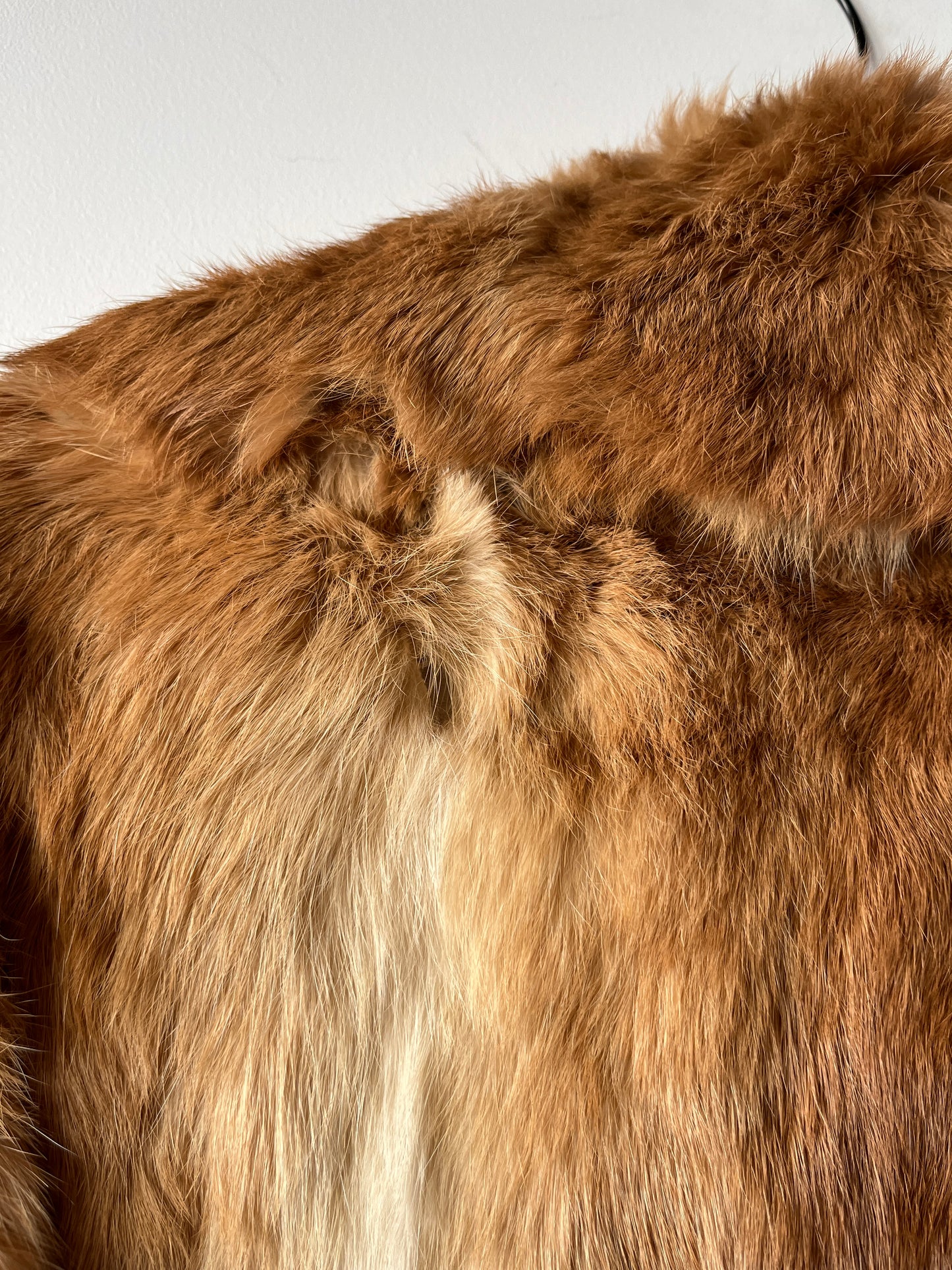 Manteau long en fourrure beige