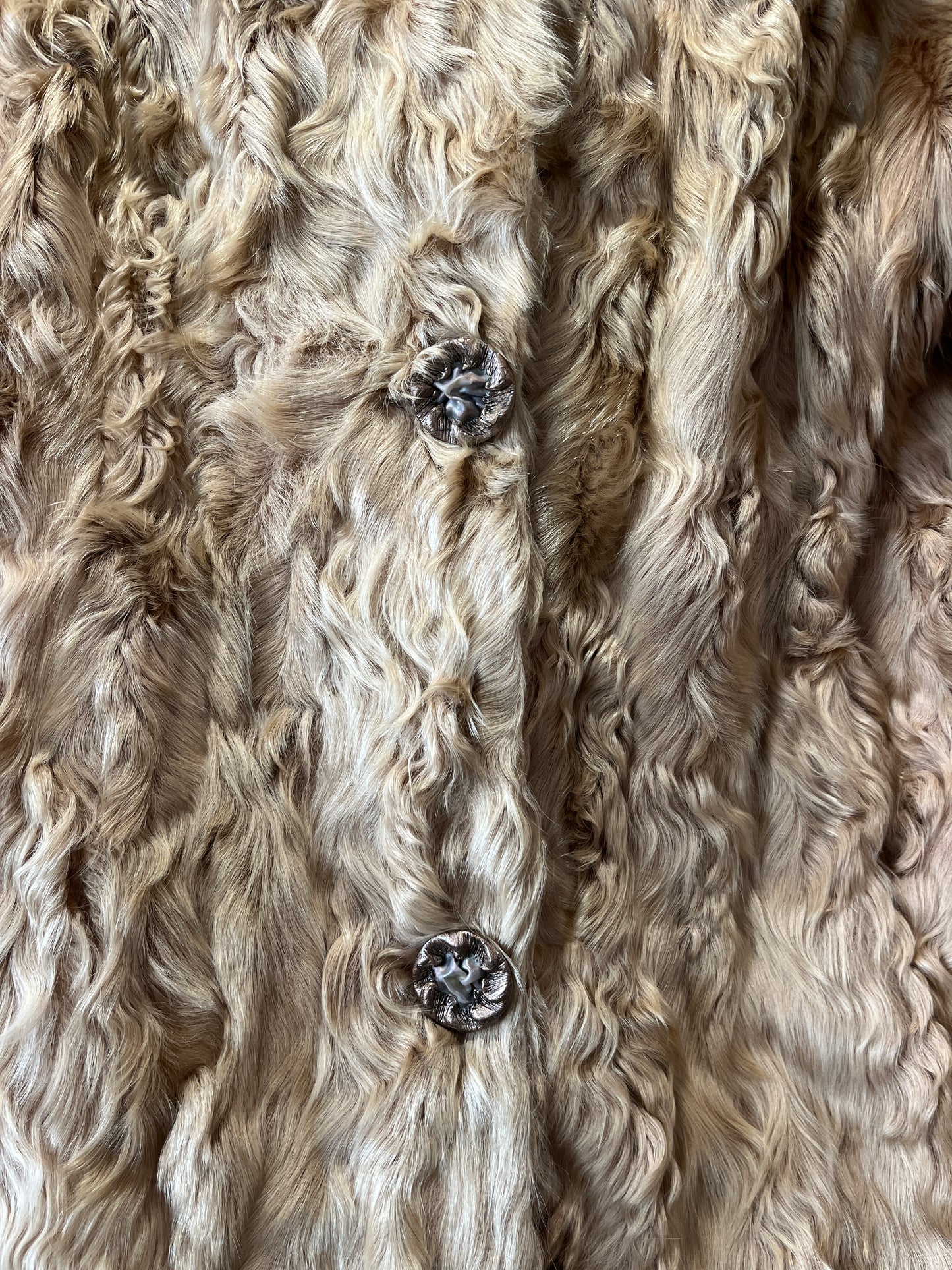 Manteau en fourrure beige