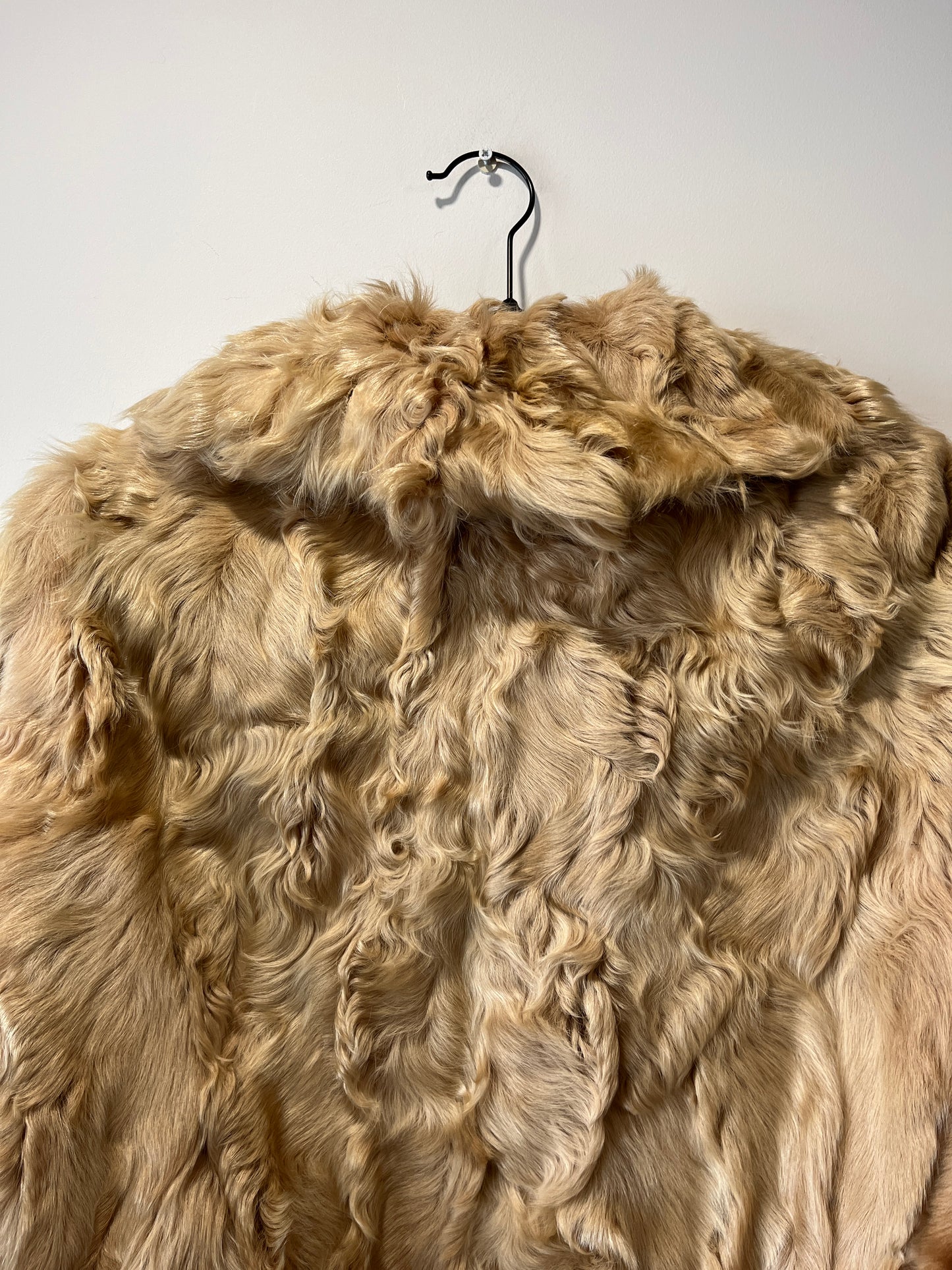 Manteau en fourrure beige
