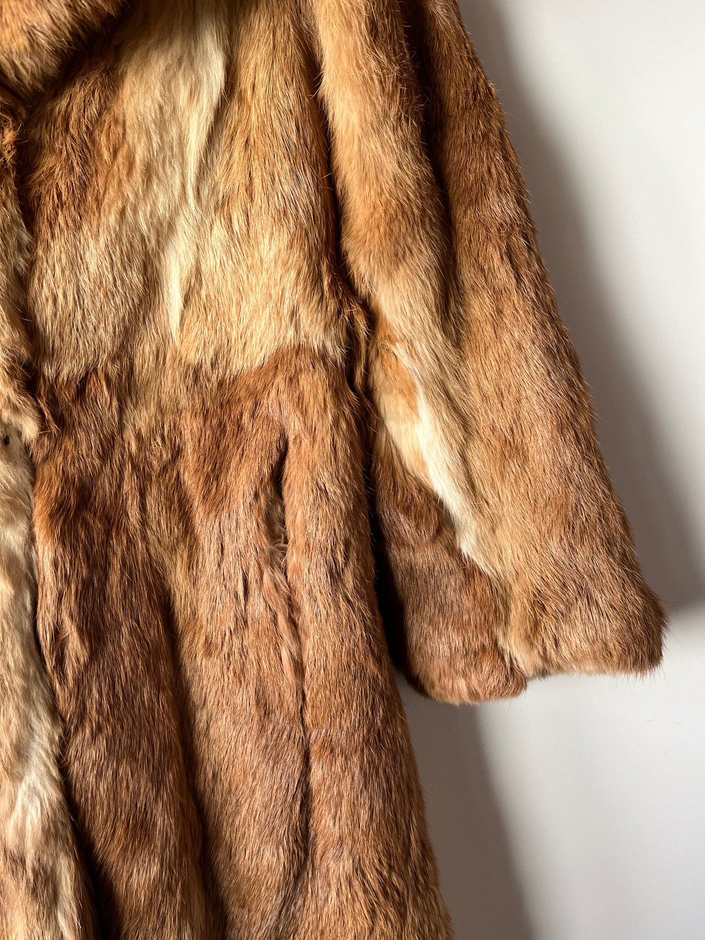 Manteau long en fourrure beige