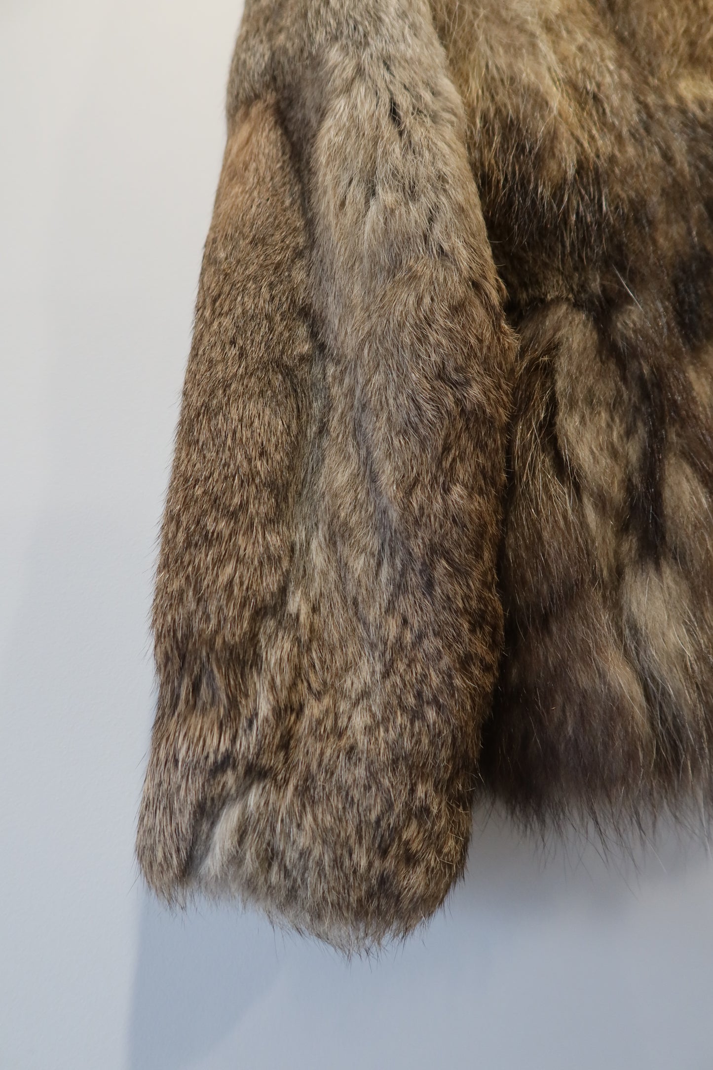 Manteau en fourrure bi-matière