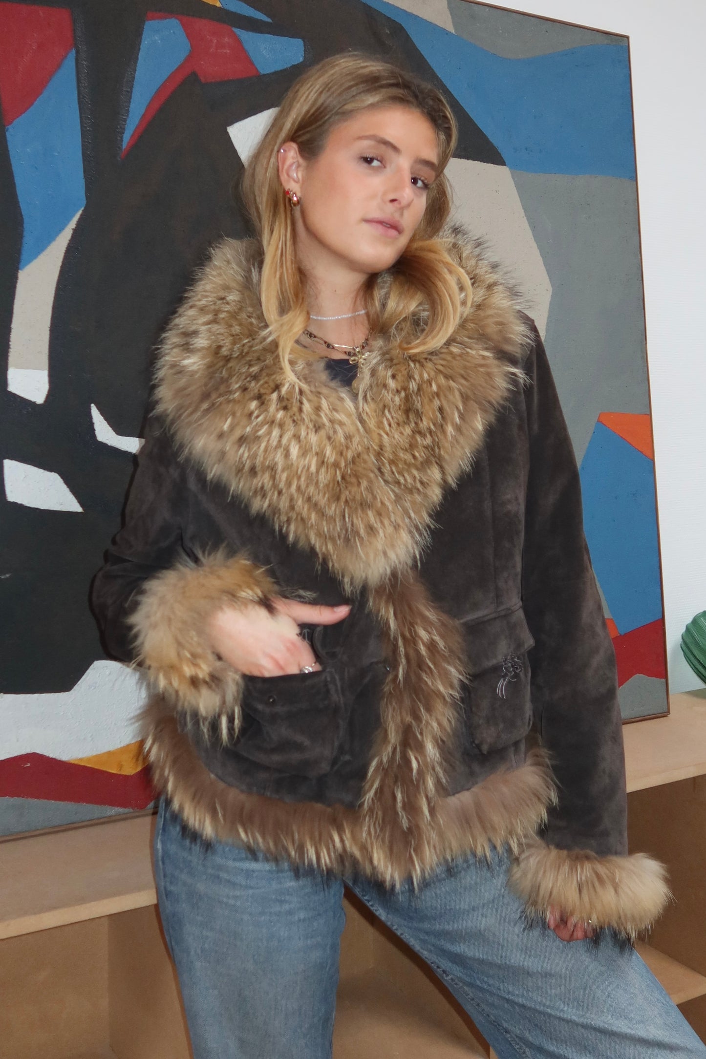 Veste en cuir avec bordures en fourrure