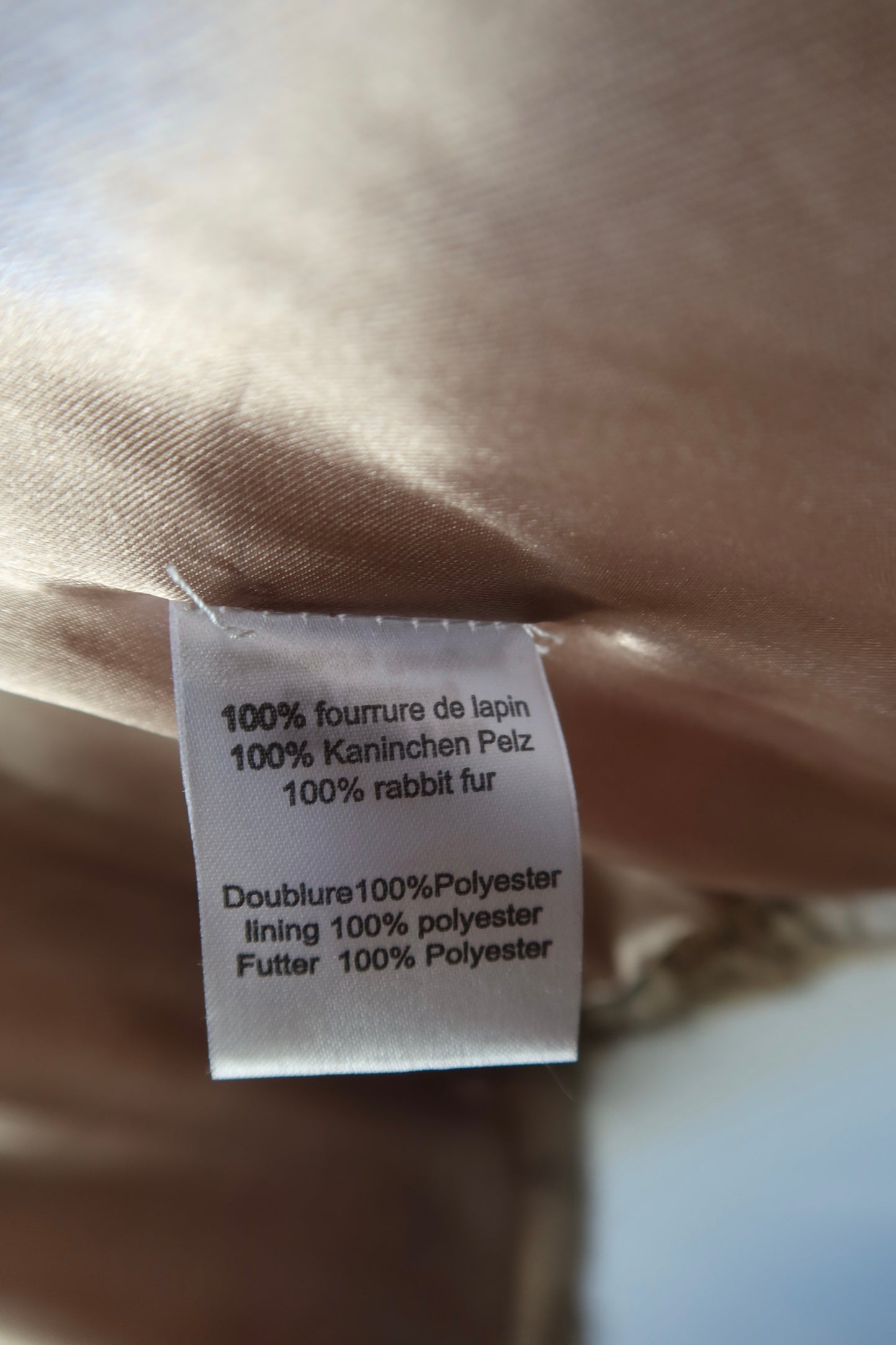 Manteau en fourrure gris