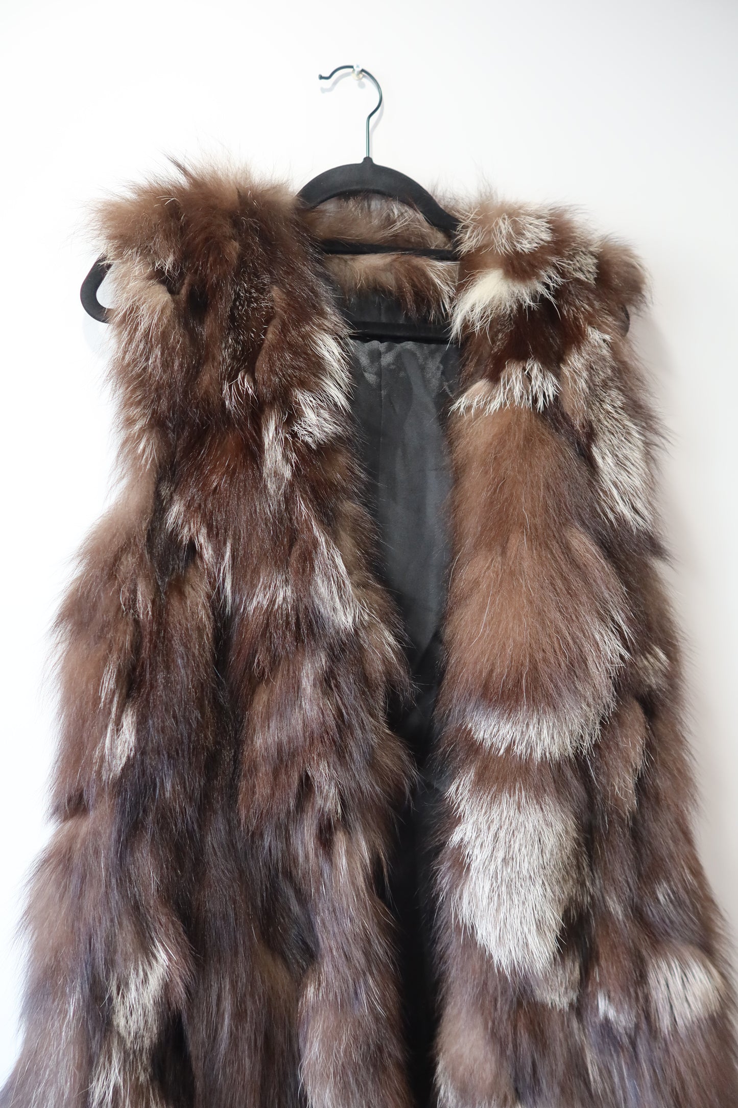 Manteau long sans manches en fourrure
