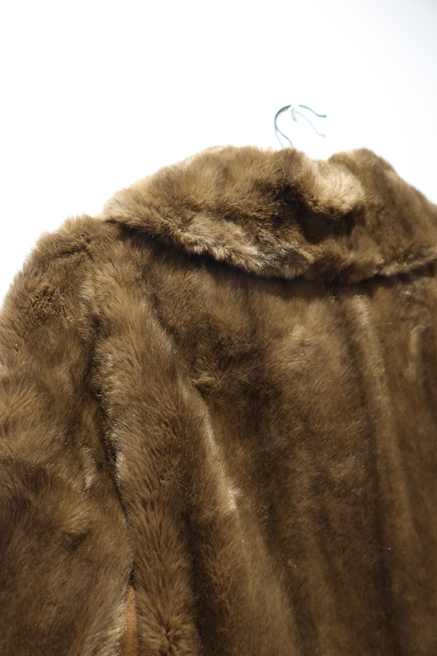 Veste marron en cuir et fausse fourrure