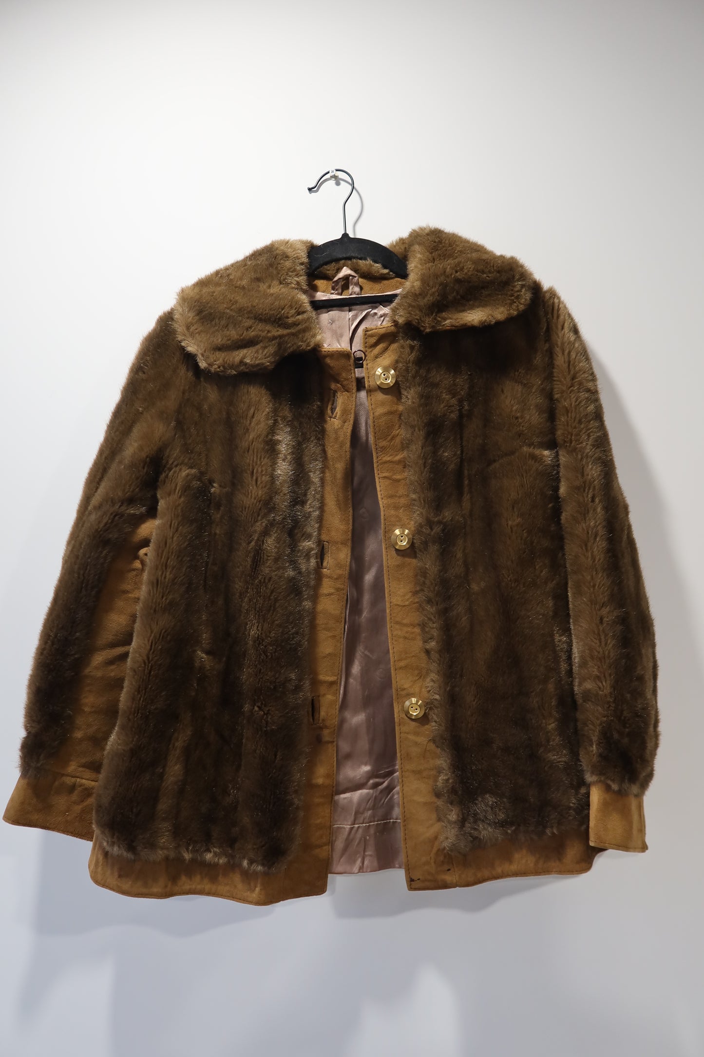 Veste marron en cuir et fausse fourrure