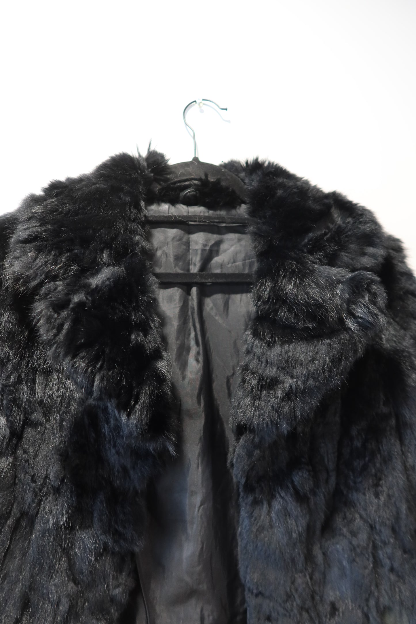 Manteau en fourrure noir