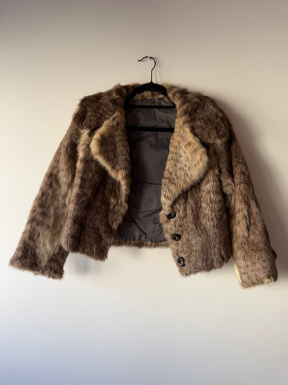 Veste en fourrure grise