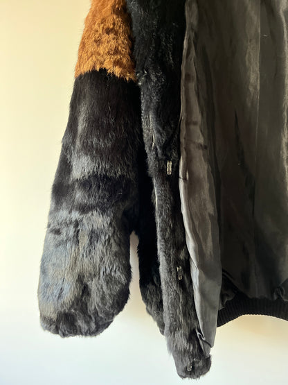 Veste en fourrure noire et léopard