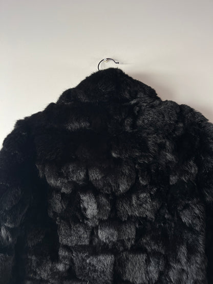 Manteau en fourrure noir