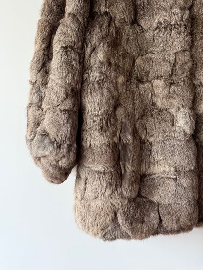 Manteau en fourrure gris
