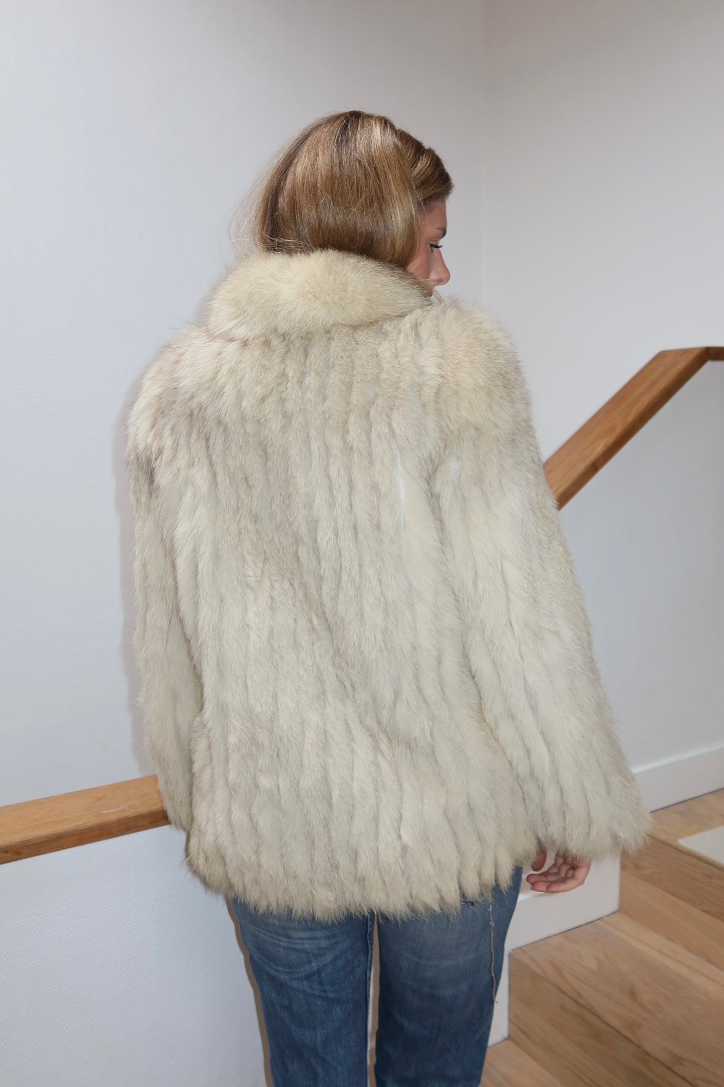 Manteau en fourrure galonné blanc