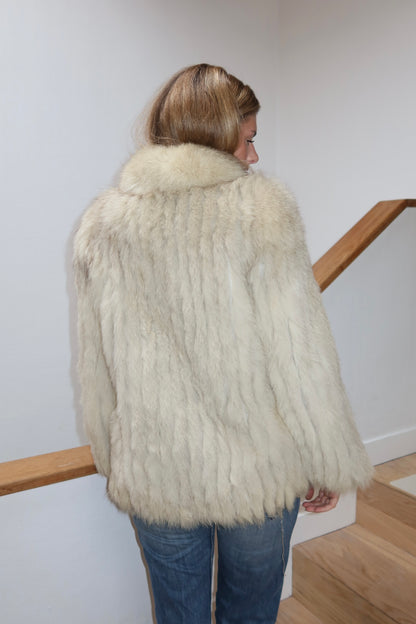 Manteau en fourrure galonné blanc