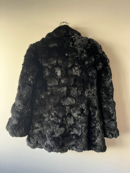 Manteau en fourrure noir