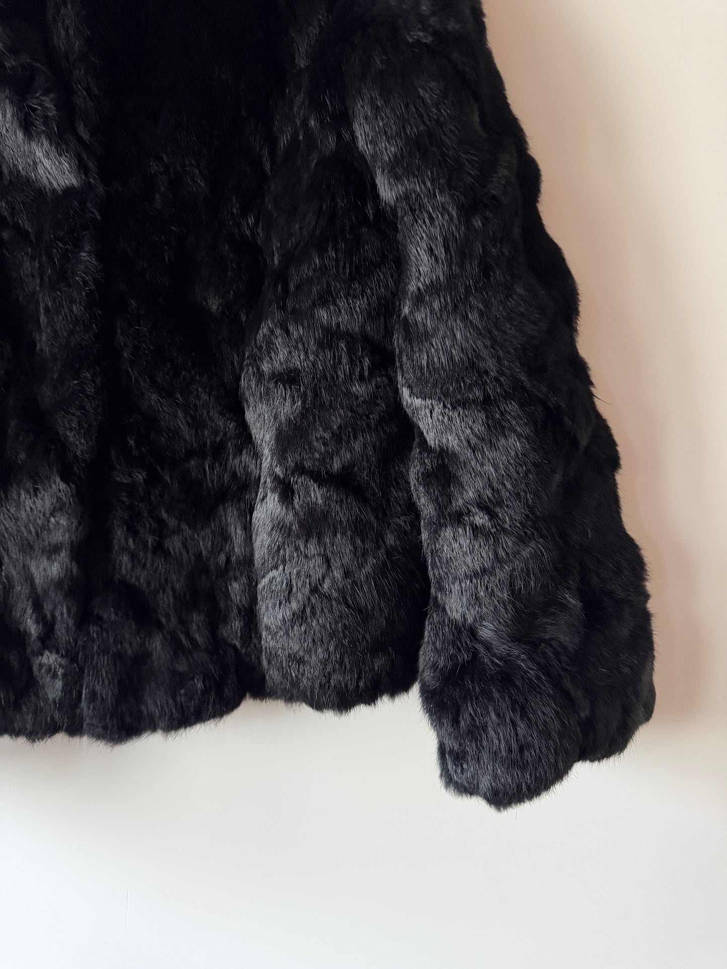 Manteau en fourrure noir