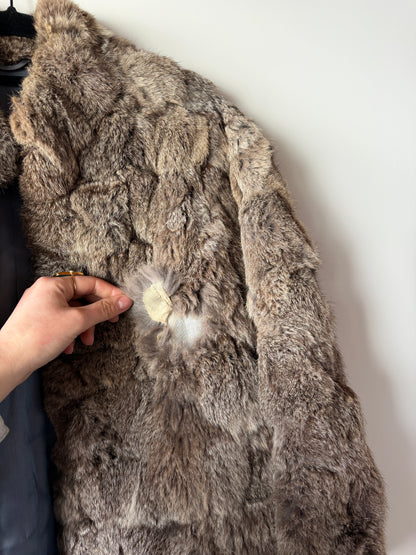 Manteau en fourrure gris