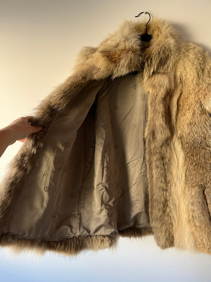 Manteau en fourrure beige et grise