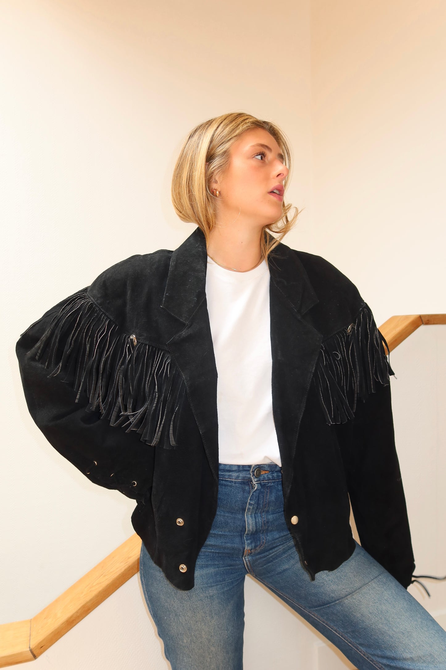 Veste en cuir noire à franges
