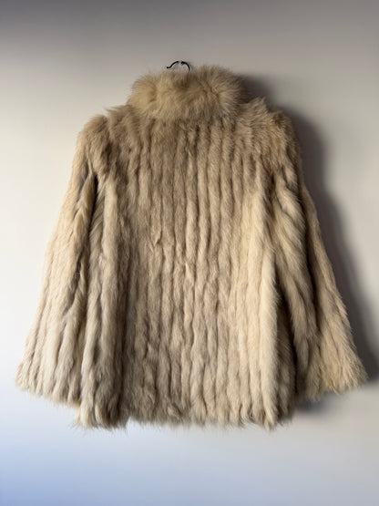 Manteau en fourrure galonné blanc