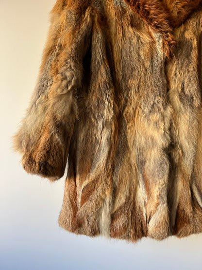 Manteau en fourrure roux doré