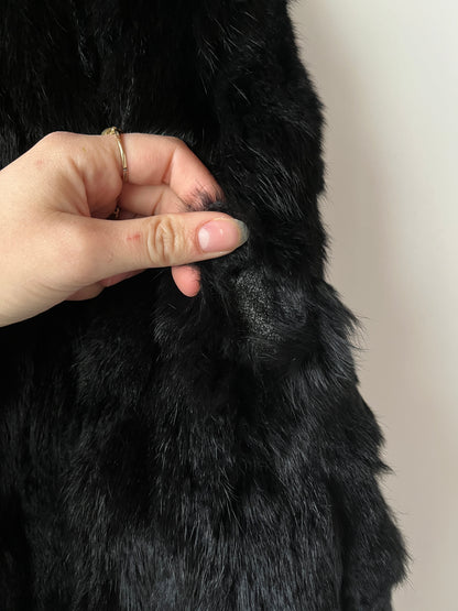 Veste courte en fourrure noire