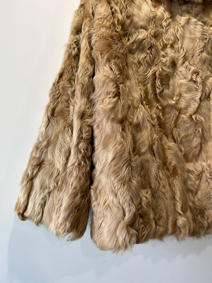 Manteau en fourrure beige