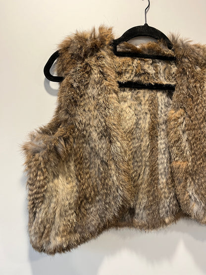 Gilet en fourrure tressée