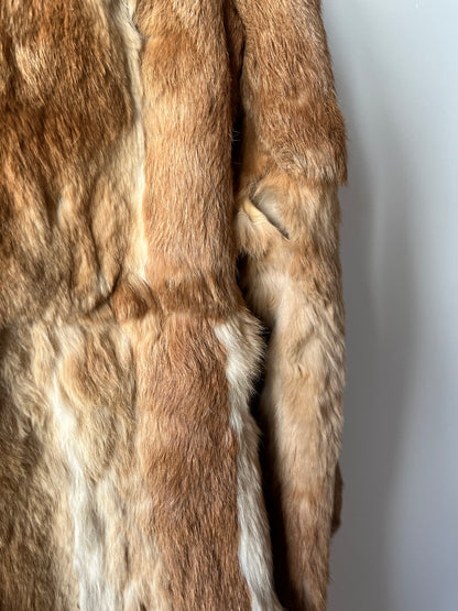 Manteau long en fourrure beige